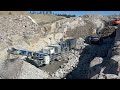 Volvo 530 excavator feed jonsson 1208 jaw crusher quarry action