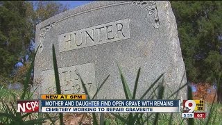 Cemetery walkers find human remains exposed