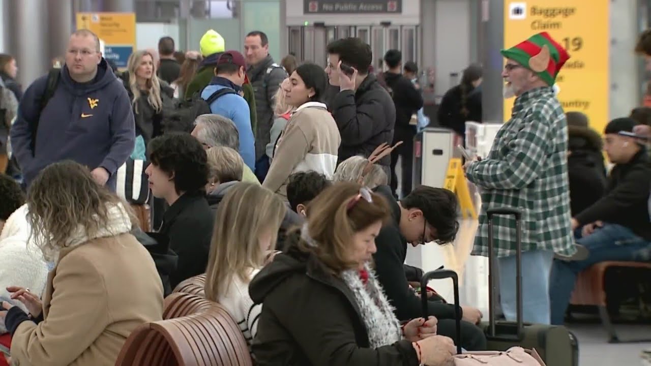 Hundreds of flights delayed at DIA on one of busiest days