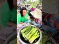 Making Ming Pov vegetables seller happy 