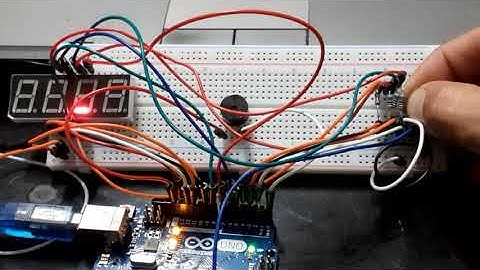 Arduino 7 segment display+ Temperature Sensor LM35+ Buzzer