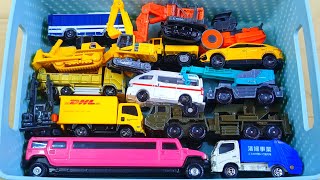 Box full of Various miniature cars Peugeot , Ambulances, cartoon cars, fire trucks with sirens L236