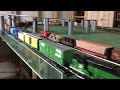 Three HO Gauge Trains running Side by Side