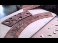 Hand cutting and crafting Italian inlaid wood table top