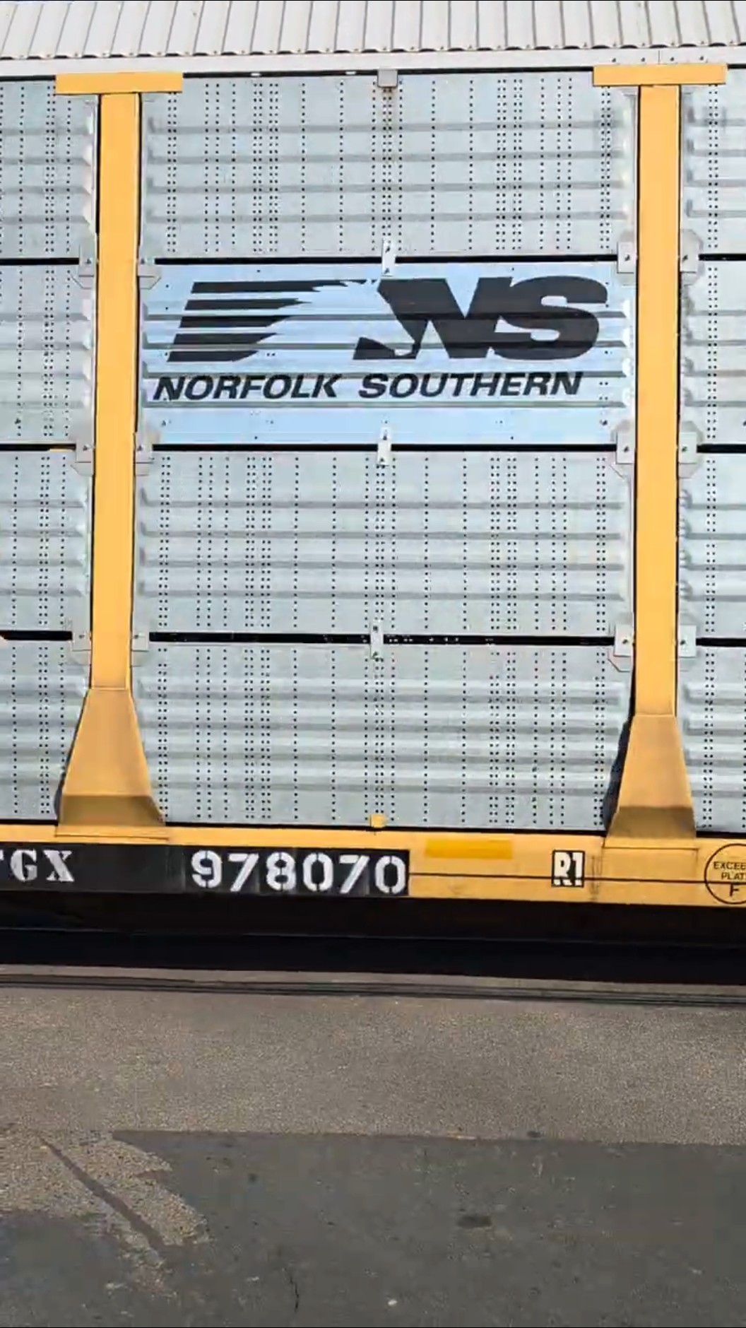 CN 8953, 5611 Eastbound train with TTZX TRAILER TRAIN center beam