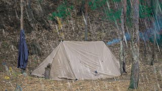 hiding in a hot tent from the rain , bushcraft survival camping , catch and cook