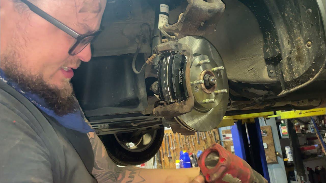Kia Soul replace front brake pads and rotors in real time - YouTube