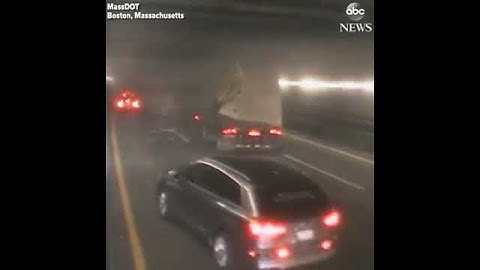 Raw Video: Tractor Trailer Hits Roof Of O