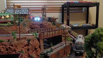 Here is a very small up and over O Scale train layout. It is built out of recycled Styrofoam.