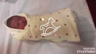 Easy way to wrap a new born baby with a soft towel.Nurse wrapping a new born baby.. screenshot 5