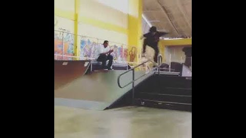 Board slide down the stair rail
