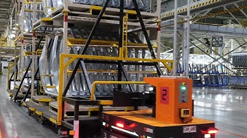 Case Study: Automating Car Part Movement for Stamping Operations with MAG1000 Tugger AMR and SyncOS™