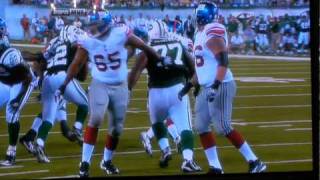 New York Jets vs. New York Giants - QB Eli Manning is crushed by Jet