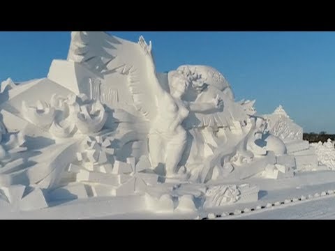 Winter Olympic-themed giant snow sculpture unveiled in NE China