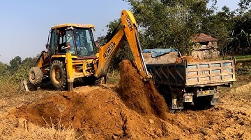 Backhoe Loader Loading Soil In Tripper Dump Video