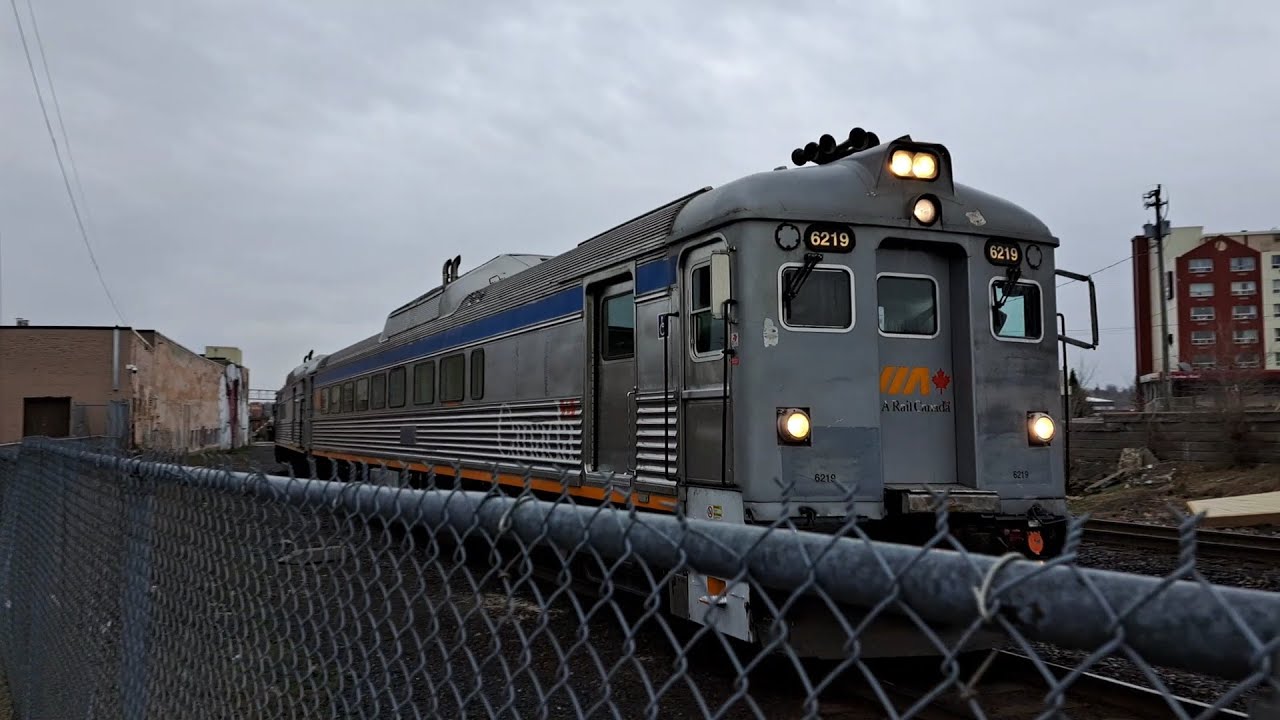 VIA Rail's Budd RDCs At Sudbury on Their Journey To White River Passing A Searchlight Tower!