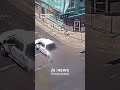 Traffic camera footage shows a building in Albuquerque, New Mexico partially collapsing onto...