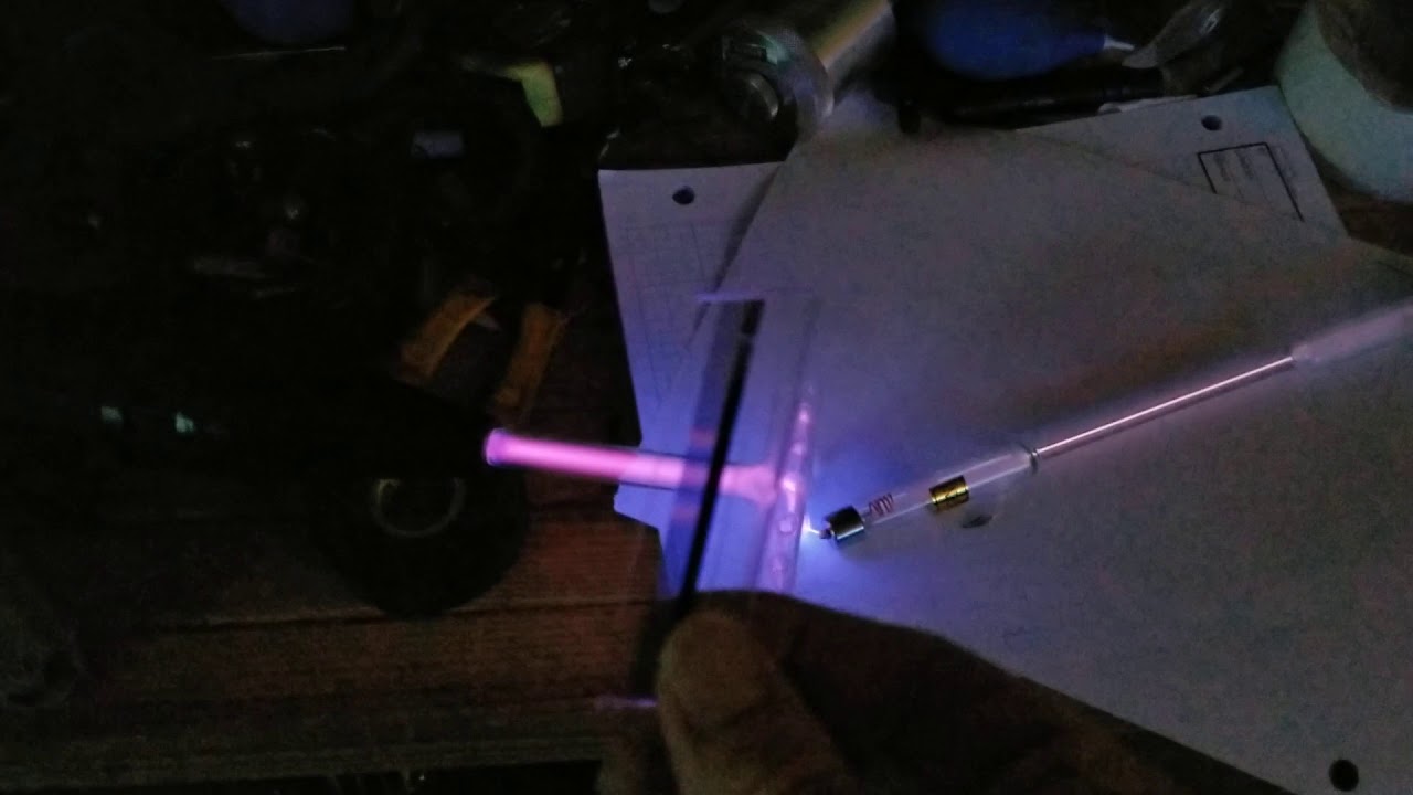 Hydrogen discharge tube charged by Violet Ray device and a diffraction