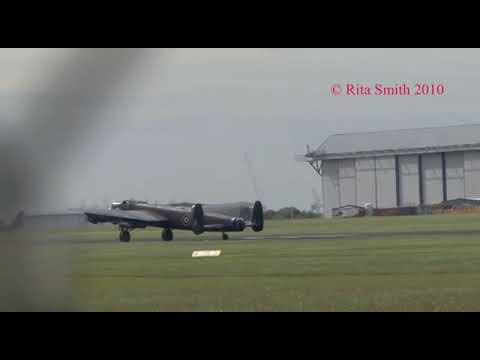 Lancaster Bomber taking off for Duxford Battle of Britain Air Show September 2010