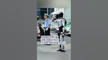 Humanoid robot joins Chinese police to guide pedestrian traffic