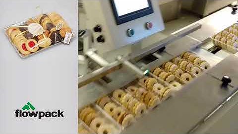 horizontal flow packing machine for cookie tray package, with automatic feeder system