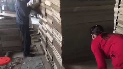 NC sheet cutter with stripper and stacker