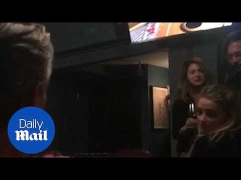 Amber Heard and Johnny Depp laugh and joke on Thanksgiving 2015