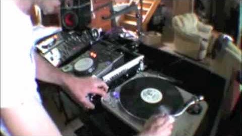 iCrates DJ Tutorial with Ellaskins of djtutor.com | How to do a spin back on a VINYL TURNTABLE