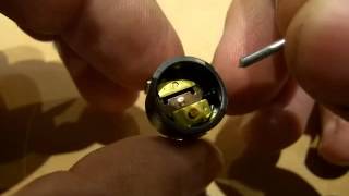 Inside A Snap-Action Disk Thermostat Manual Or Auto Reset