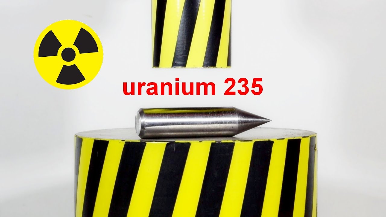 HYDRAULIC PRESS AGAINST URANIUM PROJECTILE