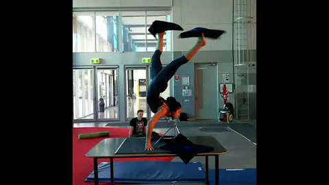 Contortionist Spins Fabric While Balancing on Chin - 991611-3