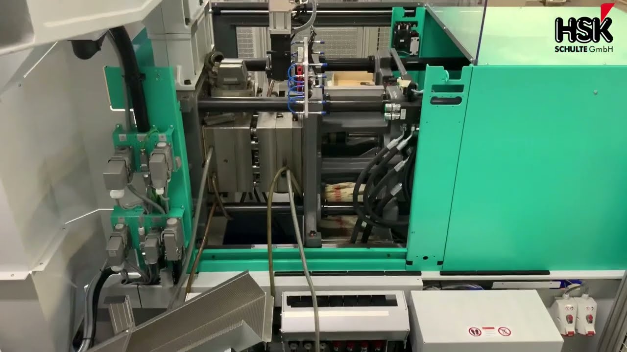 Verpacken direkt an der Spritzgussmaschine - Arburg 420