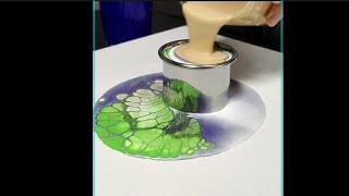 Acrylic pouring technique is ideal for beginners, creating beautiful green and blue cells
