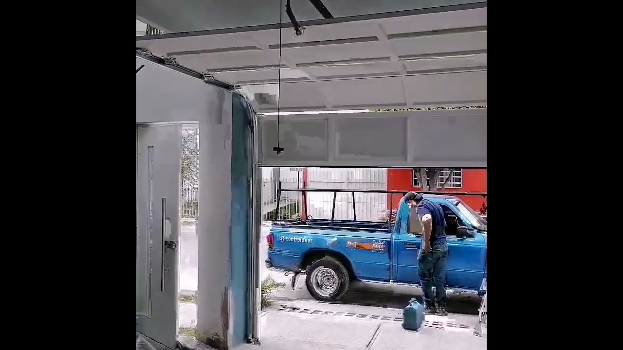 puerta ascendente de garage fabricada en herrería