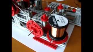 Trafo wikkelmachine van Fischer Technik (transformer winding machine)