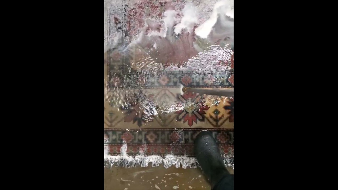Pressure washing/Cleaning deep old dirt out of a Rug/Carpet