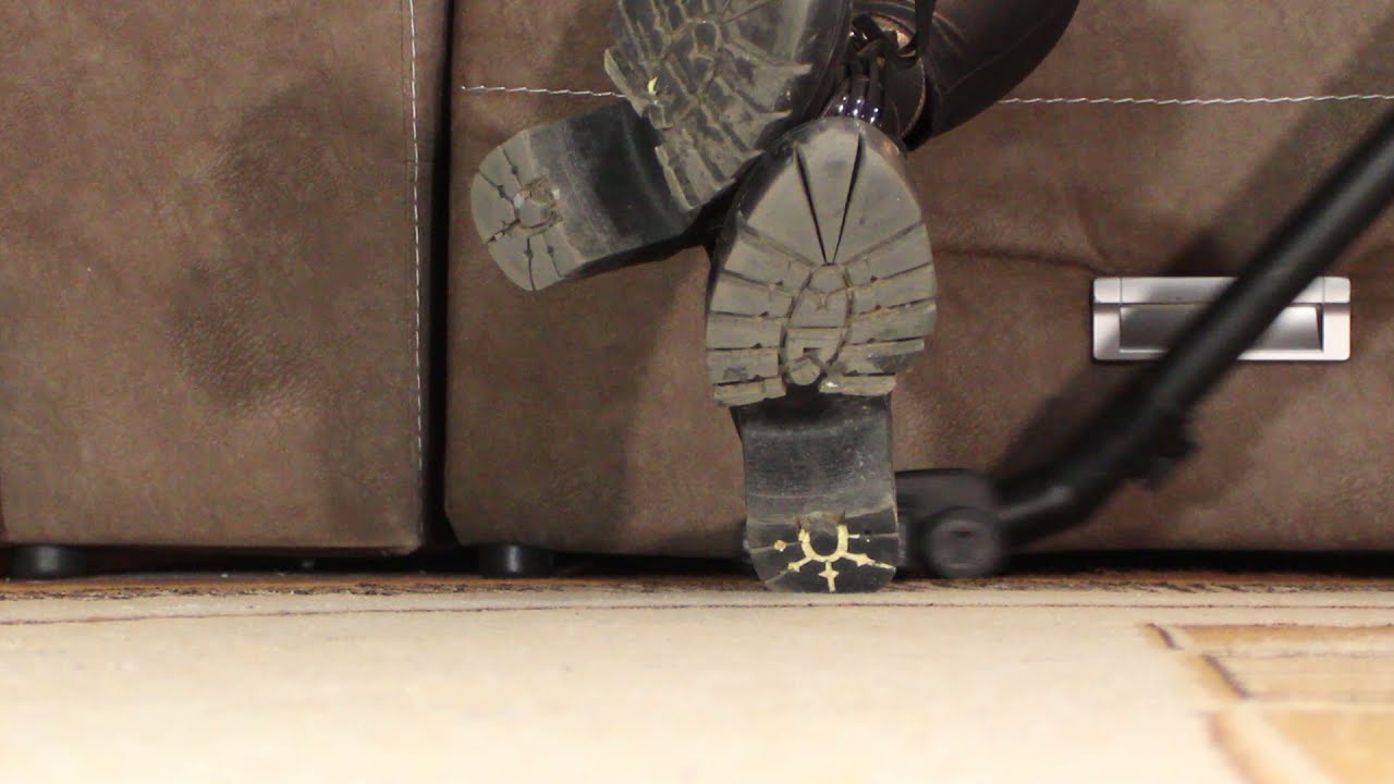 vacuum under dirty boots