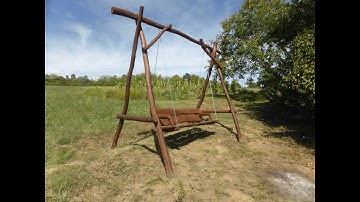 Hardwood log swing to the garden