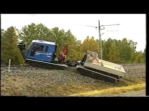 Tracked all terrain vehicle on railroad tracks. - YouTube