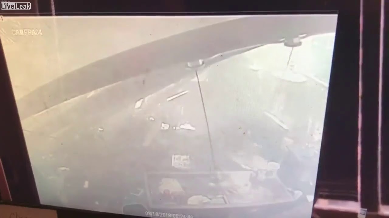 Surveillance video captures explosion at coffee shop