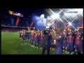 Puyol gives the trophy to Abidal and Vilanova