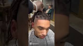 Skin fade and braids by Bigvicbarbers