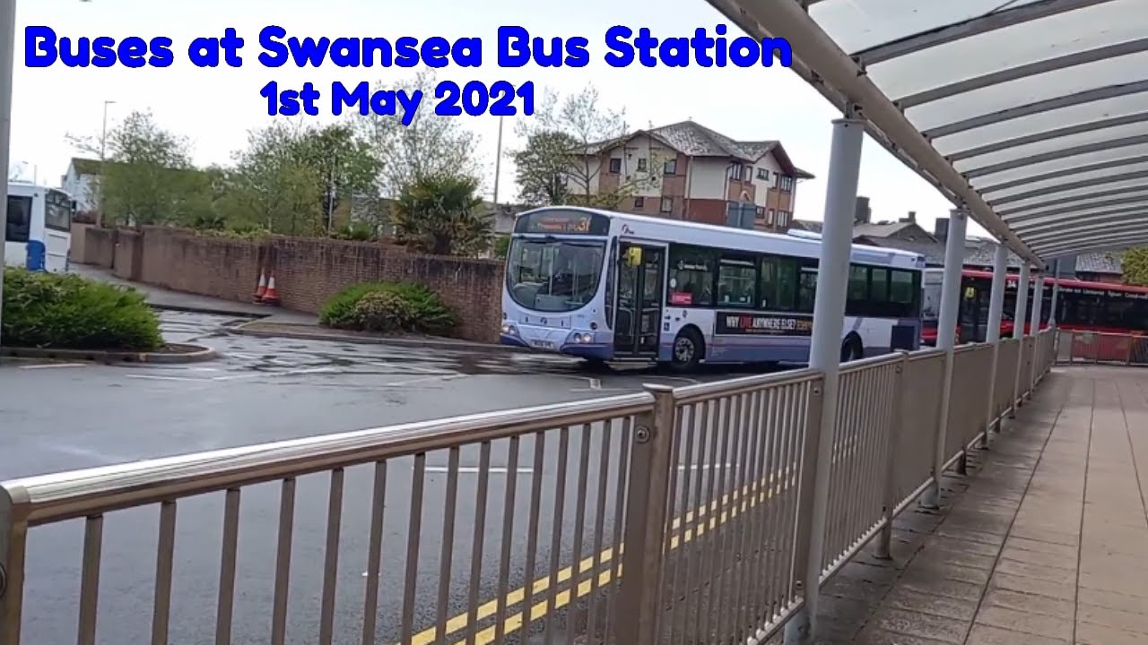 A wet and rainy day at Swansea Bus Station Buses at Swansea Bus