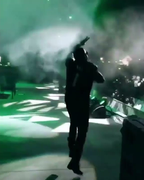 Nas with #1 Jersey arriving on stage to perform