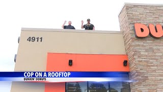 Local cops hang out on Dunkin' Donuts rooftops for Special Olympics Indiana