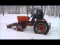 Power king tractor does white christmas snow plow