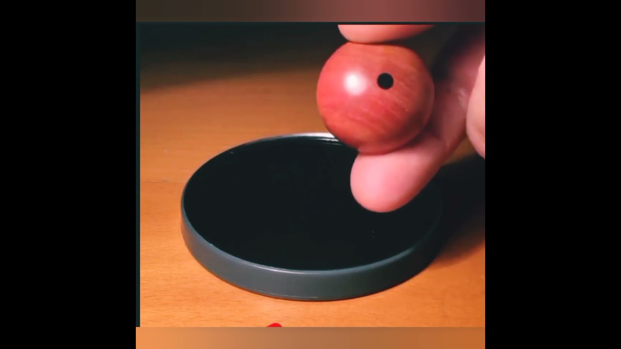 Unusual Top - Fine Wood Tippe-Top |