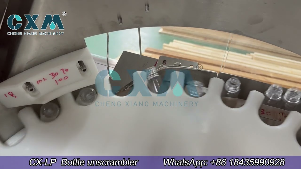 Bottle unscrambler with bottle elevator | bottle feeding machine | e-liquid bottle unscrambler