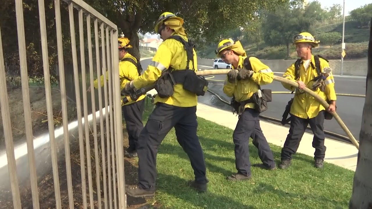 Firefighters battle to save Los Angeles-area homes