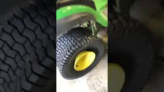 How to quickly seat a new 20-10-8 rear tire on a John Deere D140 riding mower.